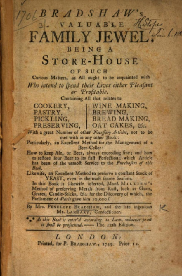 Ein altes Buch mit dem Titel 'Family Jewel Being a Store-House' ist offen und zeigt eine Seite mit geschwungener Schrift, die von einem dekorativen Rahmen umgeben ist.