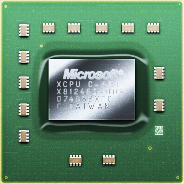 Nahaufnahme eines grünen und cremefarbenen Mikroprozessor-Chips auf einem gelben Hintergrund mit dem Wort "Microsoft" darauf.