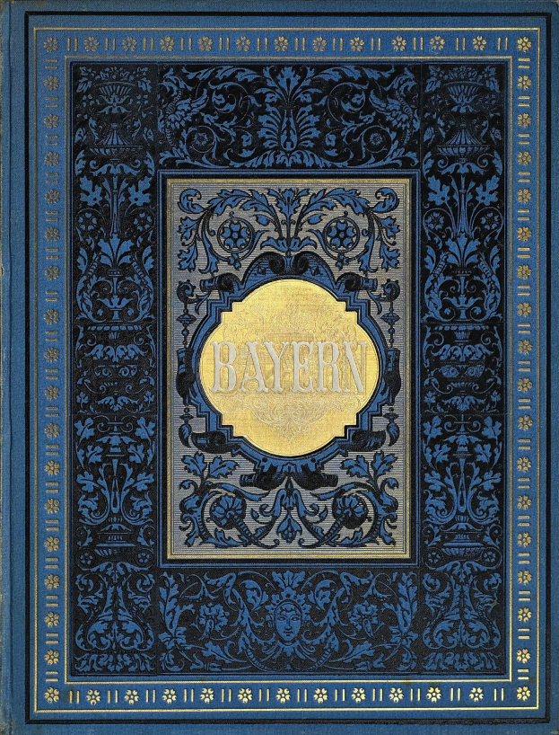 Ein blau-goldenes Buch mit dem Wort 'Bayern' auf dem kunstvoll gestalteten Einband.