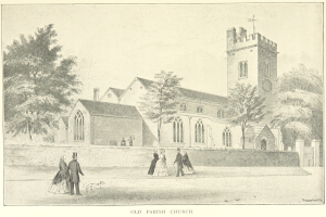 Alte steinerne Pfarrkirche mit Menschen davor, umgeben von Bäumen unter einem klaren blauen Himmel, mit Text unten.